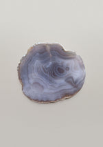 Bovenaanzicht By Nature Onderzetter Lune – unieke patronen in grijs-blauwe tinten.